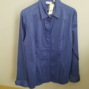 Blue button up blouse with ruffle trim.